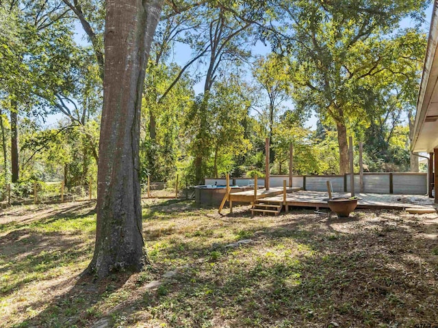 view of yard featuring a pool side deck