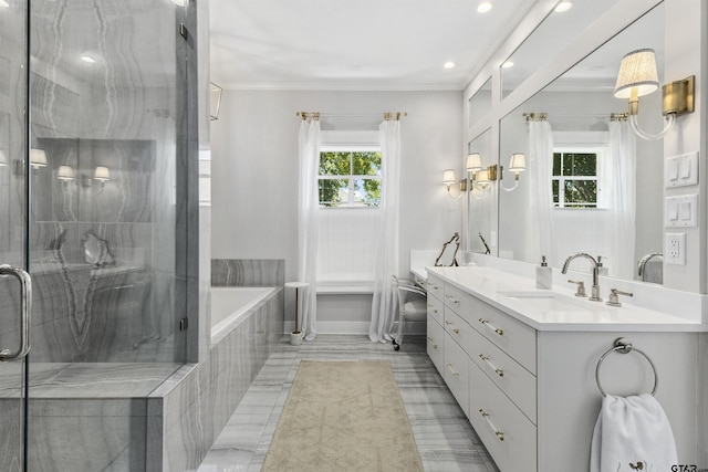 bathroom with separate shower and tub, vanity, and ornamental molding