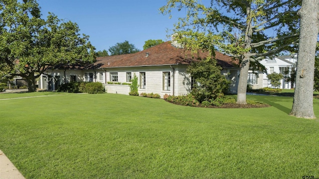 exterior space featuring a lawn