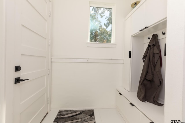 mudroom with tile patterned floors