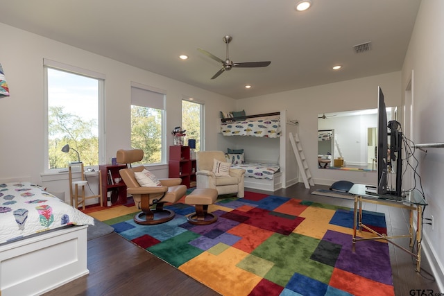 bedroom featuring ceiling fan and dark hardwood / wood-style flooring