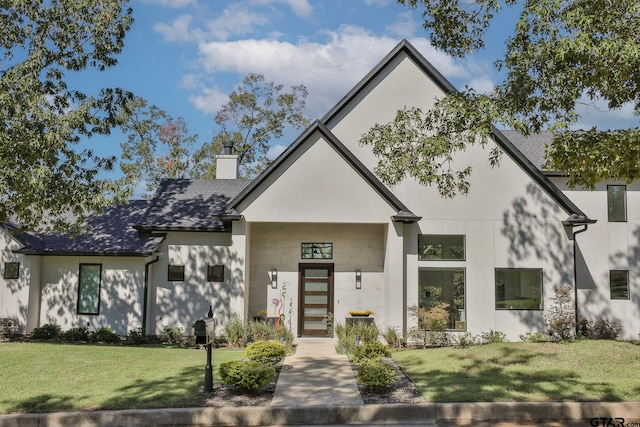 view of front of home with a front yard