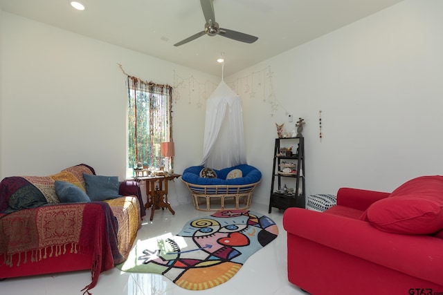 living room with concrete floors and ceiling fan