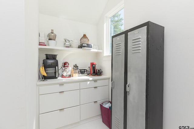 interior space featuring white cabinets