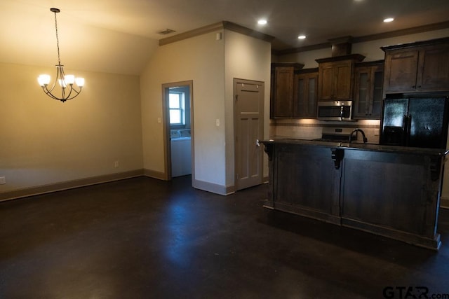 kitchen featuring ornamental molding, dark brown cabinets, decorative light fixtures, a notable chandelier, and lofted ceiling