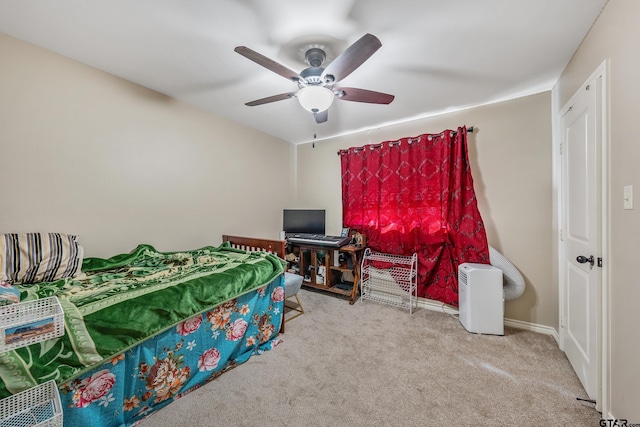 bedroom with light colored carpet and ceiling fan