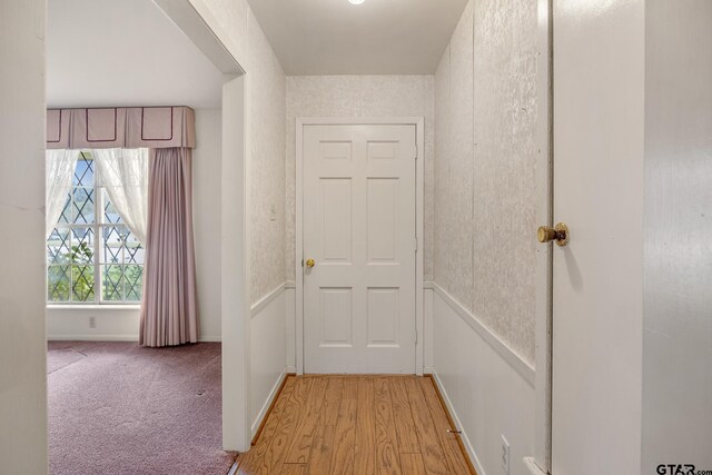 hallway featuring light wood-type flooring