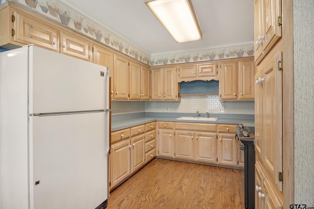 kitchen featuring light brown cabinetry, light hardwood / wood-style flooring, crown molding, black electric range oven, and white refrigerator