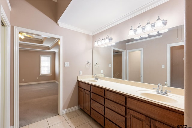 bathroom with ceiling fan, vanity, crown molding, and tile patterned flooring