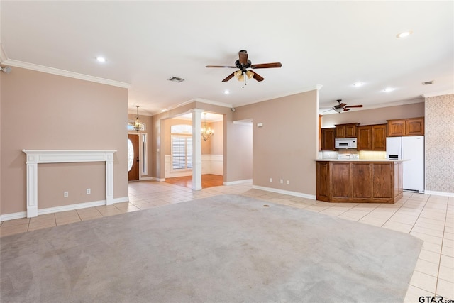 unfurnished living room with light tile patterned flooring, ceiling fan with notable chandelier, and ornamental molding