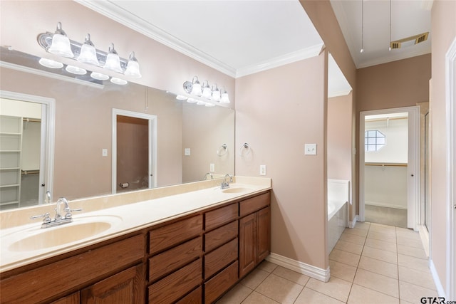 bathroom featuring a washtub, vanity, ornamental molding, and tile patterned flooring