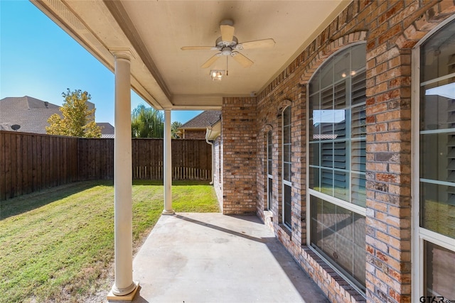 view of patio featuring ceiling fan