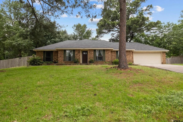 9331 Londonderry Dr, Tyler, TX 75703 - single story home featuring driveway, a garage, and brick siding