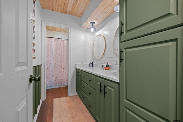 9331 Londonderry Dr, Tyler, TX 75703 - full bath featuring backsplash, double vanity, wood finished floors, and wooden ceiling