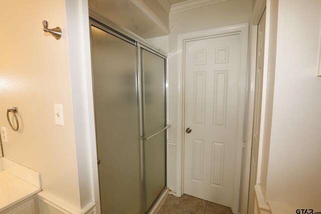 18751 Ridgeline, Tyler, TX 75703 - full bath featuring a stall shower, ornamental molding, and tile patterned floors