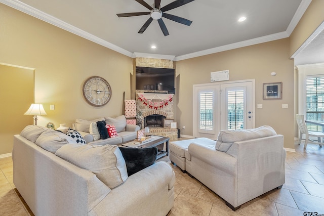 living room featuring a fireplace, a wealth of natural light, and crown molding