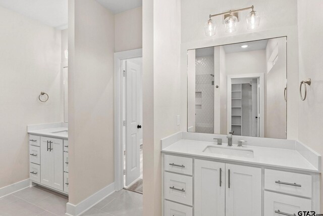 bathroom featuring vanity and tile patterned floors