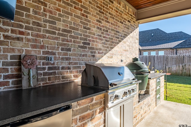 view of patio / terrace with area for grilling and exterior kitchen