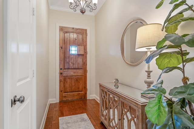 7216 Princedale, Tyler, TX 75703 - entryway featuring ornamental molding, hardwood / wood-style flooring, and a chandelier