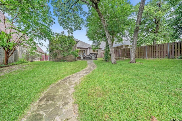 7216 Princedale, Tyler, TX 75703 - fenced backyard featuring a deck