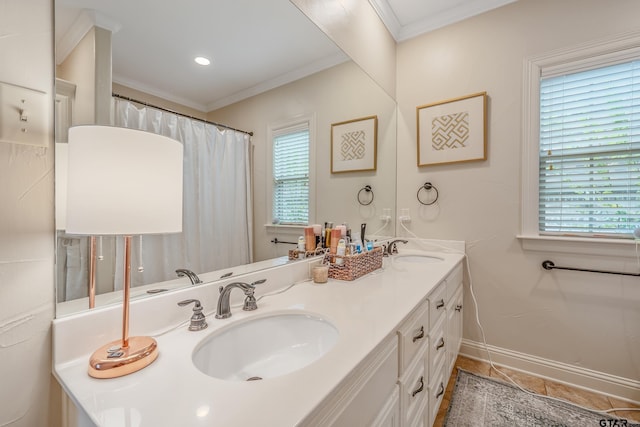7216 Princedale, Tyler, TX 75703 - full bathroom with double vanity, crown molding, and healthy amount of natural light