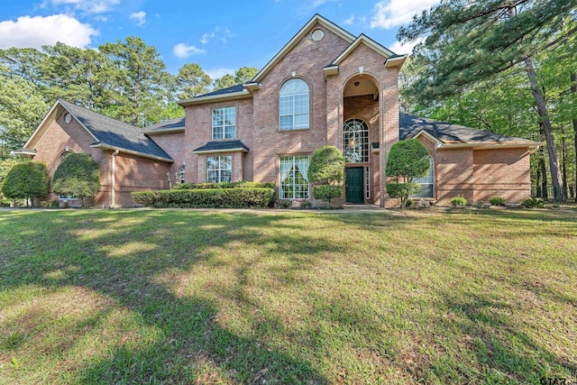 18050 Deer Trl, Flint, TX 75762 - view of front of property with brick siding and a front lawn