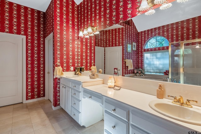 18050 Deer Trl, Flint, TX 75762 - bathroom featuring a sink, a shower stall, double vanity, and wallpapered walls