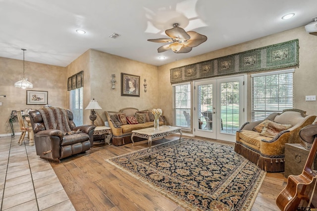 18050 Deer Trl, Flint, TX 75762 - living room featuring visible vents, a ceiling fan, light wood-style floors, recessed lighting, and french doors