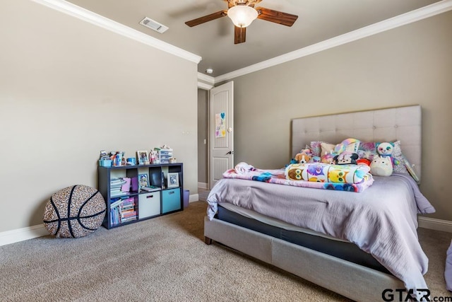 bedroom with carpet floors, visible vents, crown molding, and baseboards