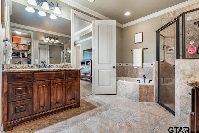 full bathroom with a shower stall, a garden tub, and crown molding