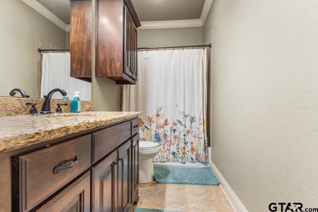 full bath featuring toilet, ornamental molding, vanity, and a textured wall
