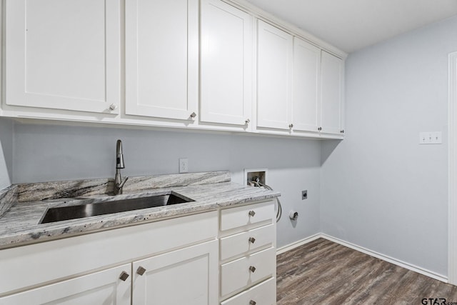 laundry area featuring sink, cabinets, washer hookup, hookup for an electric dryer, and dark hardwood / wood-style floors