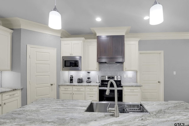 kitchen featuring premium range hood, decorative backsplash, ornamental molding, and stainless steel appliances