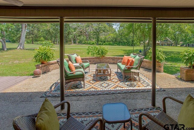 225 Texas Dr, Hideaway, TX 75771 - view of patio with outdoor lounge area and view of scattered trees