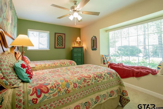 225 Texas Dr, Hideaway, TX 75771 - bedroom with carpet flooring, baseboards, and ceiling fan