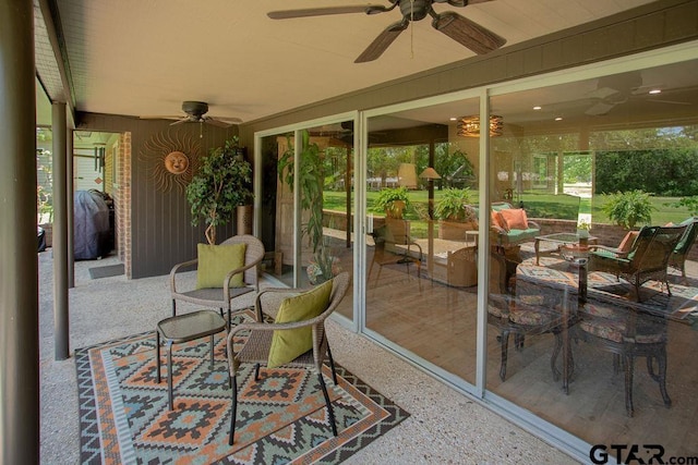225 Texas Dr, Hideaway, TX 75771 - sunroom featuring a ceiling fan and heating fuel