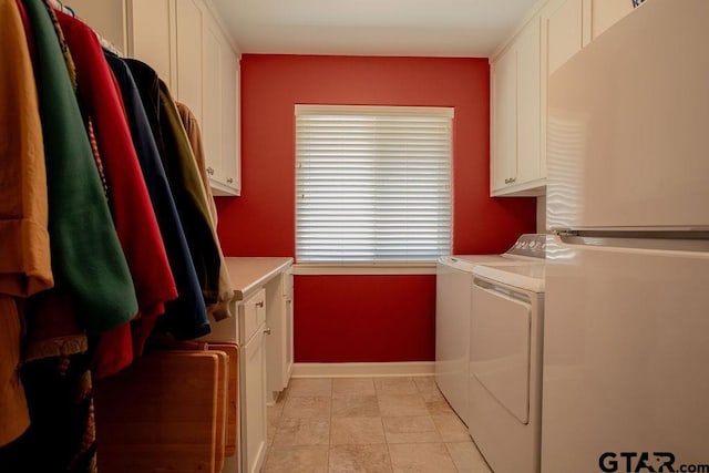 225 Texas Dr, Hideaway, TX 75771 - laundry room with washer and clothes dryer, cabinet space, and baseboards