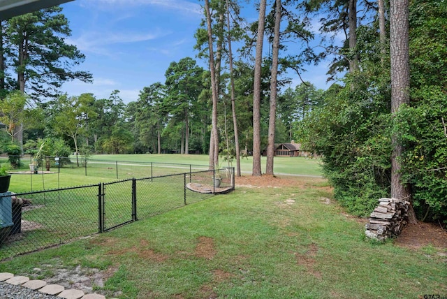 view of yard featuring a gate and fence