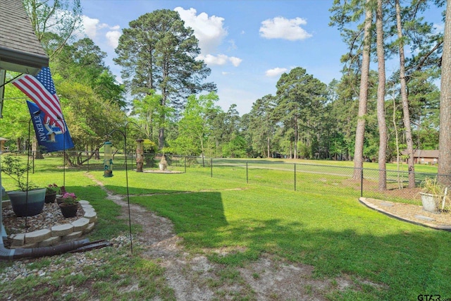 view of yard featuring fence