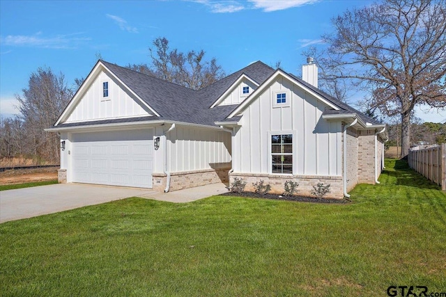 modern farmhouse style home featuring brick siding, concrete driveway, a chimney, board and batten siding, and a front yard