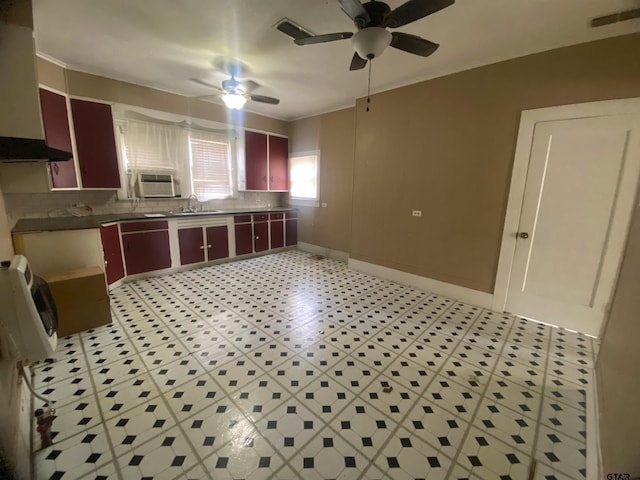 kitchen featuring sink, exhaust hood, ceiling fan, and cooling unit