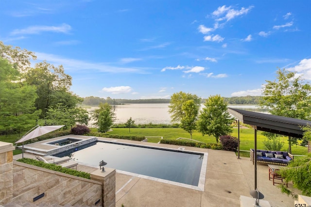 view of swimming pool with a lawn, a patio, a water view, and an in ground hot tub