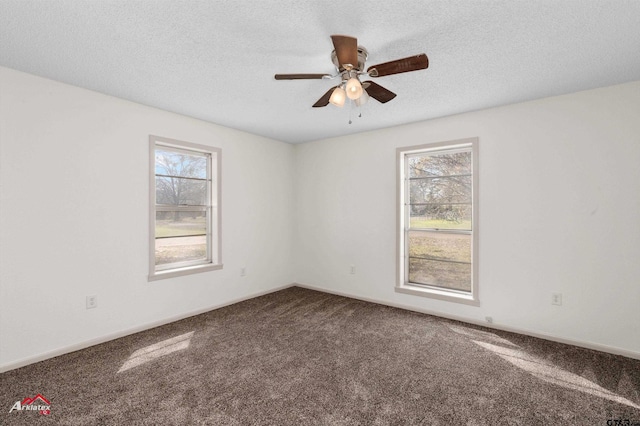197 Sherman St, Rusk, TX 75785 - carpeted spare room with a textured ceiling and ceiling fan