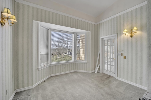 interior space featuring baseboards and wallpapered walls