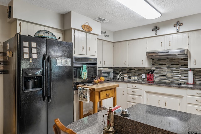 kitchen featuring visible vents, decorative backsplash, black appliances, under cabinet range hood, and dark countertops