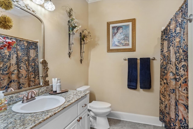 3351 Cascades Ct, Tyler, TX 75709 - full bath featuring tile patterned flooring, toilet, vanity, and baseboards