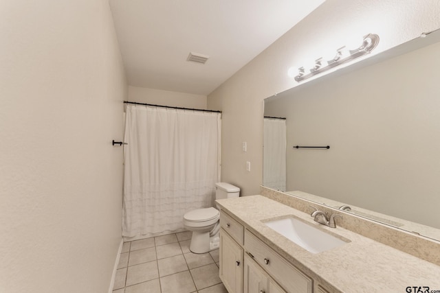 1881 Woodbridge Dr, Sulphur Springs, TX 75482 - bathroom featuring tile patterned floors, vanity, and toilet