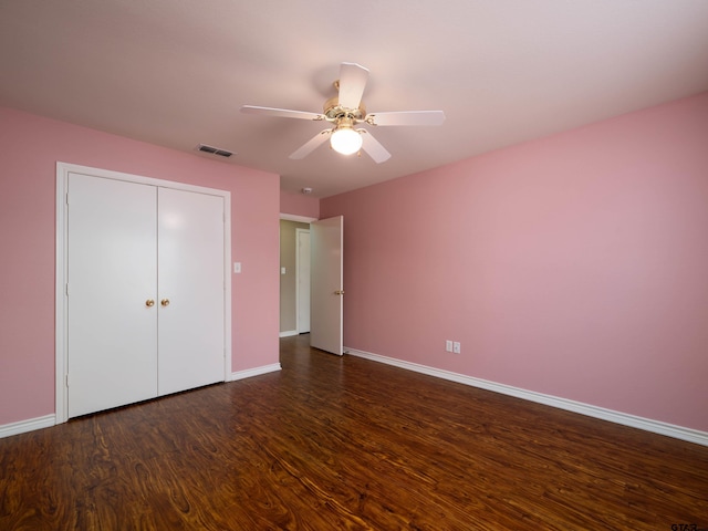 1521 Rice Rd Unit U102, Tyler, TX 75703 - unfurnished bedroom with wood finished floors, a closet, and a ceiling fan