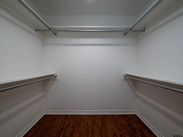 1521 Rice Rd Unit U102, Tyler, TX 75703 - spacious closet featuring dark wood-style flooring