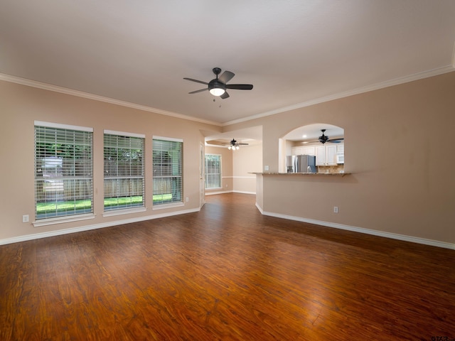 1521 Rice Rd Unit U102, Tyler, TX 75703 - unfurnished living room with a ceiling fan, dark wood-style flooring, and ornamental molding